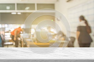 White stone marble table top and blurred abstract background from interior building banner backdrop with desk blur, counter work