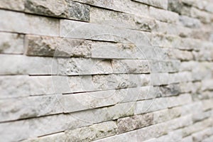 White stone wall in perspective with texture and bricks