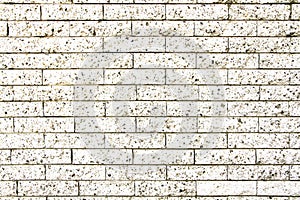 White stone wall: simple grungy white brick stone wall as seamless pattern texture background