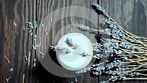 White stones stack, zen, spa, near dry lavender branches, on a wooden background