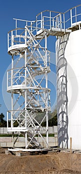 White storage tank with stairs