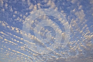 White streak cirrus clouds in high blue sky