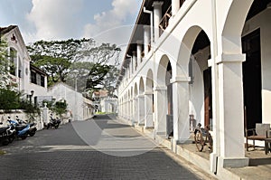 White street with pavement and arcade building in Fort Galle Sri Lanka