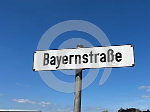 White street sign saying Bayern street. Translated from german.