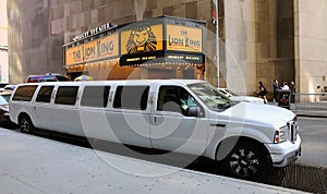 White Stretch Limo On Broadway