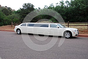 White stretched limousine for celebrities and special events