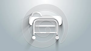 White Stretcher icon isolated on grey background. Patient hospital medical stretcher. 4K Video motion graphic animation