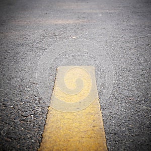 White stripe road markings on the asphalt road.