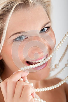 White strong teeth and pearls