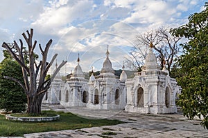 White stupas called the world`s largest book at Kuthodaw Pagoda in Mandalay, Myanmar Burma.