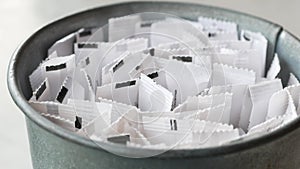 white sugar in a paper packet on table