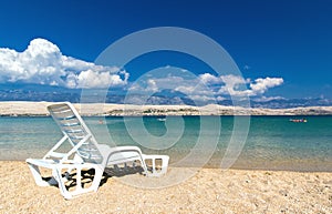 White sun bed on beautiful beach of Croatia
