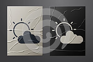 White Sun and cloud weather icon isolated on crumpled paper background. Paper art style. Vector
