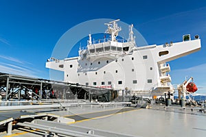 White superstructure of the tanker under blue sky photo