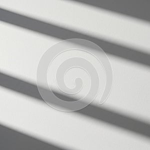 White surface with diagonal, parallel shadows cast across it, creating a simple