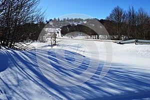 white surface of snow and shadows on it