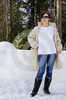 White sweatshirt mockup of a woman wearing black snow boots