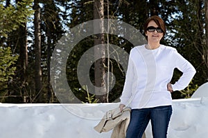 White sweatshirt mockup of a woman in the winter forest