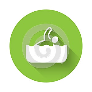 White Swimmer athlete icon isolated with long shadow background. Green circle button. Vector