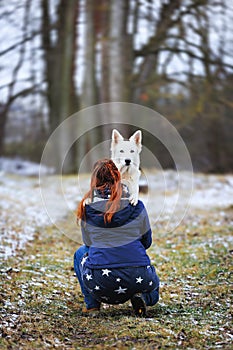 White Swiss Shepherds laying on walking