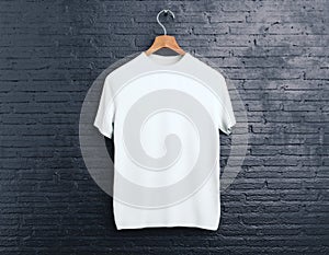 White t-shirt on brick background