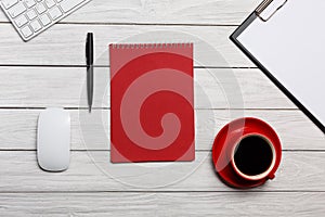 White table boards folder red notepad cup morning coffee workflow preparation meeting