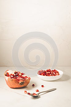 white table of grenades fruit, the purified red seeds of pomegranate in a bowl/grenades fruit, purified red seeds of pomegranate