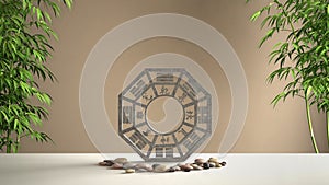 White table shelf with ba gua, pebble stone and bamboo plants, brown orange background with copy space, zen concept interior