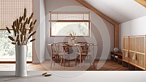 White table top or shelf with straws, dry plants, ornament, ears, sheaf, branch in vase, over japandi wooden penthouse dining room