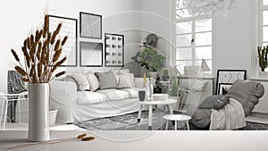 White table top or shelf with straws, dry plants, ornament, ears, sheaf, branch in vase, over scandinavian living room, sofa,