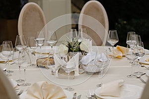 White table with white roses