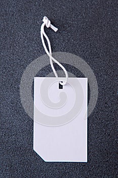 White Tag on Dark Background