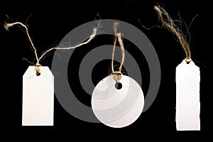 White Tags With Twine on Black Background