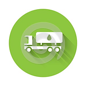 White Tanker truck icon isolated with long shadow. Petroleum tanker, petrol truck, cistern, oil trailer. Green circle
