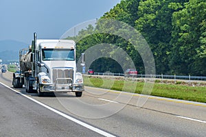 White Tanker Truck On Interstate Highway With Copy Space