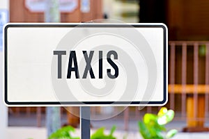 White taxis sign