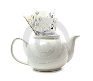 White teapot full of money