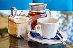 White teaset on tray in restaurant