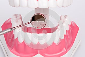 White teeth and dental instruments