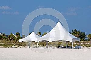 White tents on the beach