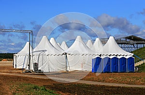 White tents at the exhibition camp