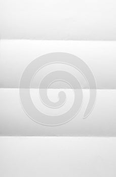 White textured sheet of paper folded in four
