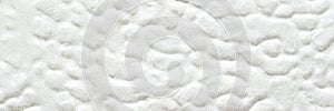 White textured surface with soft fluffy patterns in abstract design