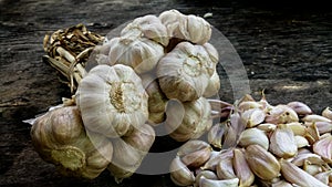 White Thai Garlic on Black Wooden Background