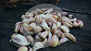 White Thai garlic on a black wooden background