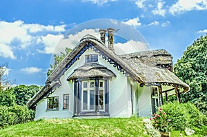 White thatched cottage, England