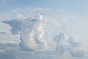 White and thick clouds in a blue sky. Cloudy sky