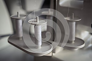 White threads on sewing machine