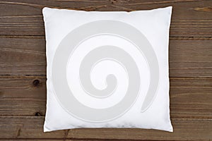 White Throw Pillow Mockup on Rustic Brown Wood