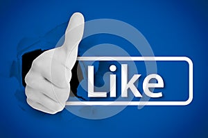 White thumb up tearing a canvas with the like from social networks